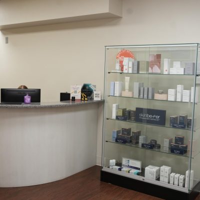 celebration-front-desk-skincare-display-institute-of-aesthetic-surgery